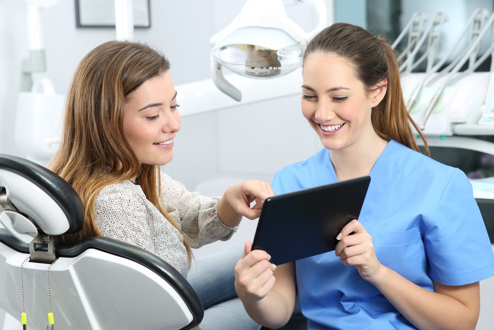 Dr. Basil in conversation with a patient